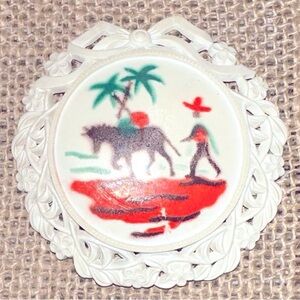 Vintage Celluloid Man in 10-Gallon/Sombrero, horse, palms, setting sun scene pin
